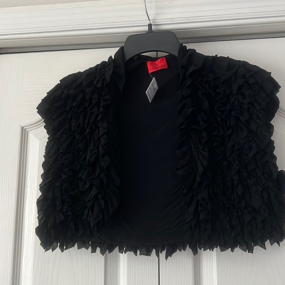 Black cover for a top.